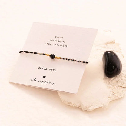 A Beautiful Story Black Onyx Gold Colored Bracelet